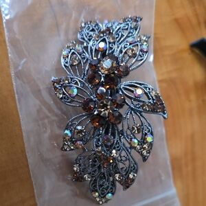 Elegant Silver and Brown Crystal Brooch